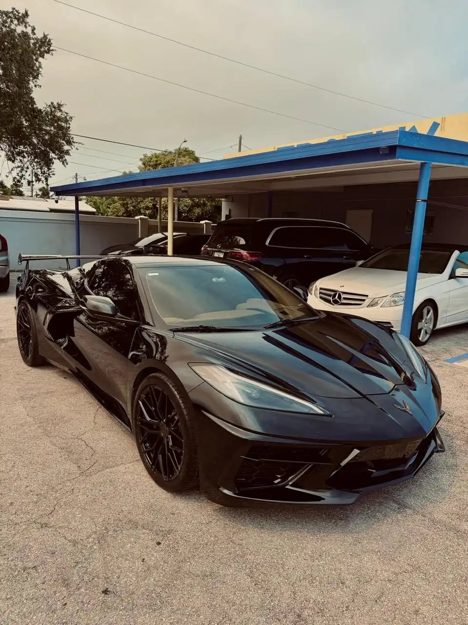 Black Corvette low front angle, glossy finish