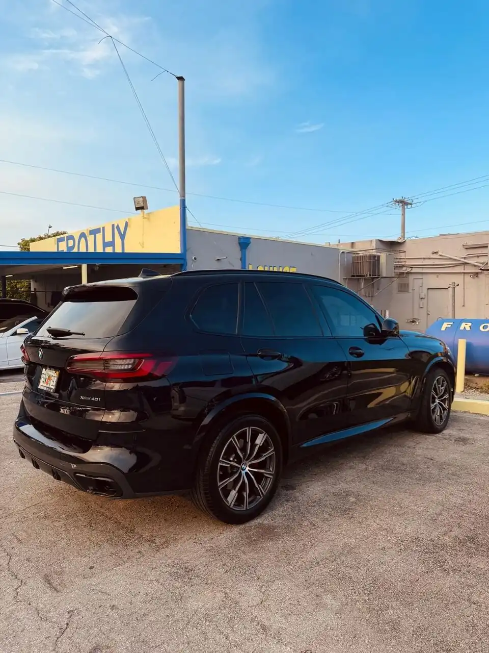 Black SUV rear view, clean exterior
