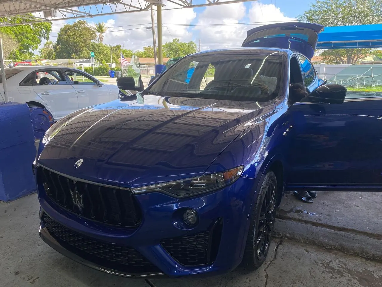 Blue Maserati Levante after a full detail