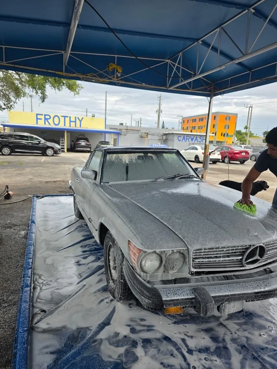 Classic Mercedes convertible getting hand washed