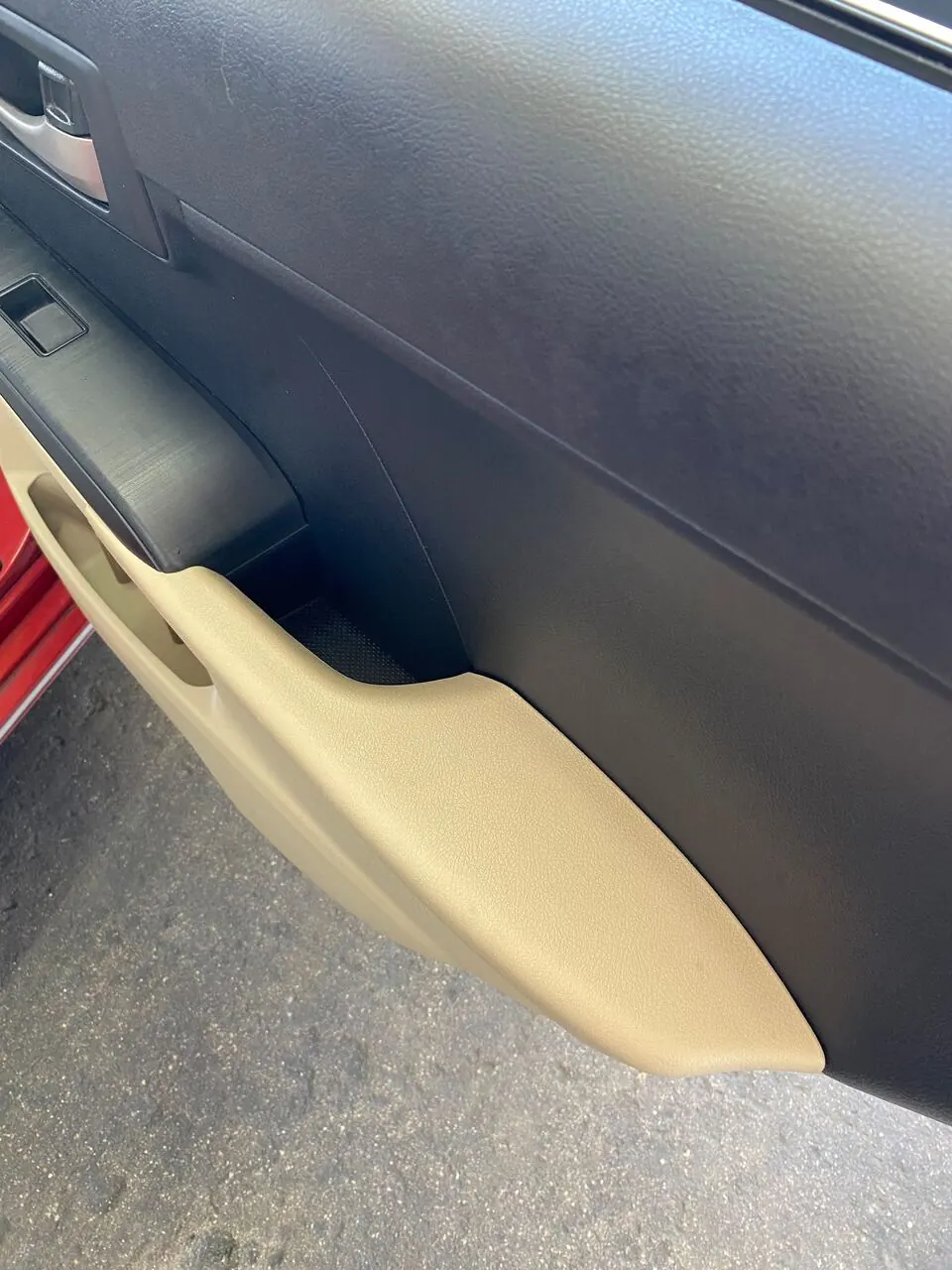 Clean tan door panel close-up after an interior detail
