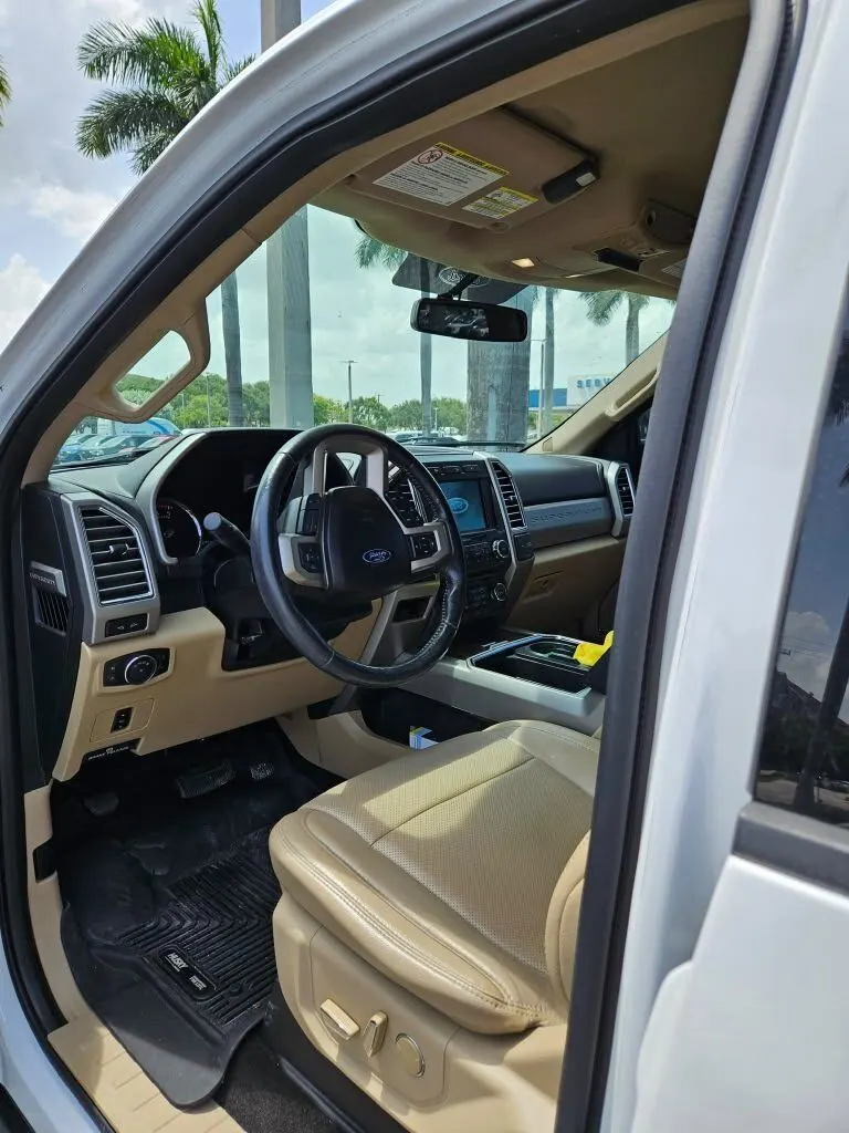 Clean tan leather truck interior after a detail