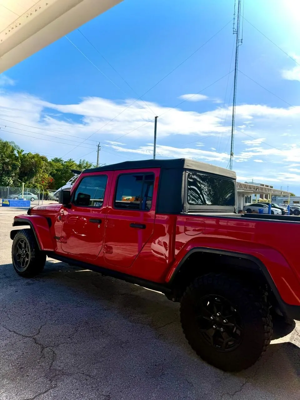 Red Jeep Gladiator side view, clean exterior