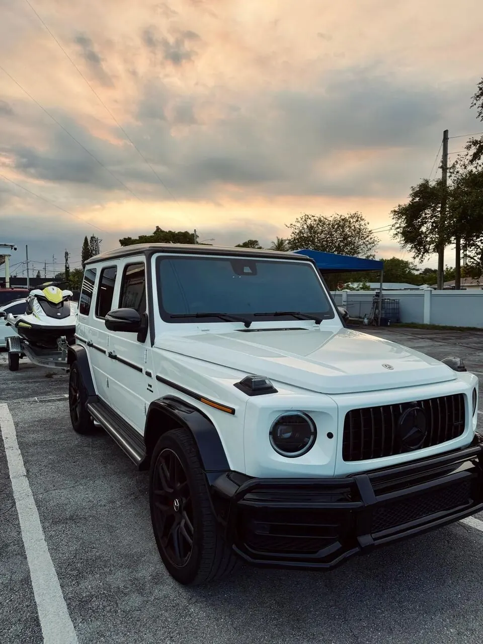 White Mercedes-AMG G63 front view, alternate angle