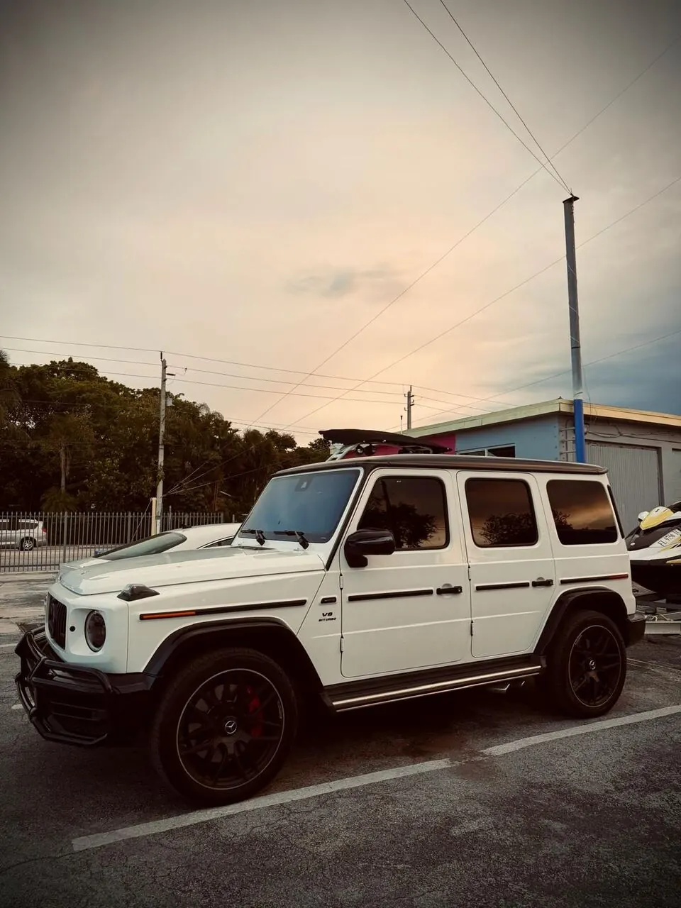 White Mercedes-AMG G63 side view
